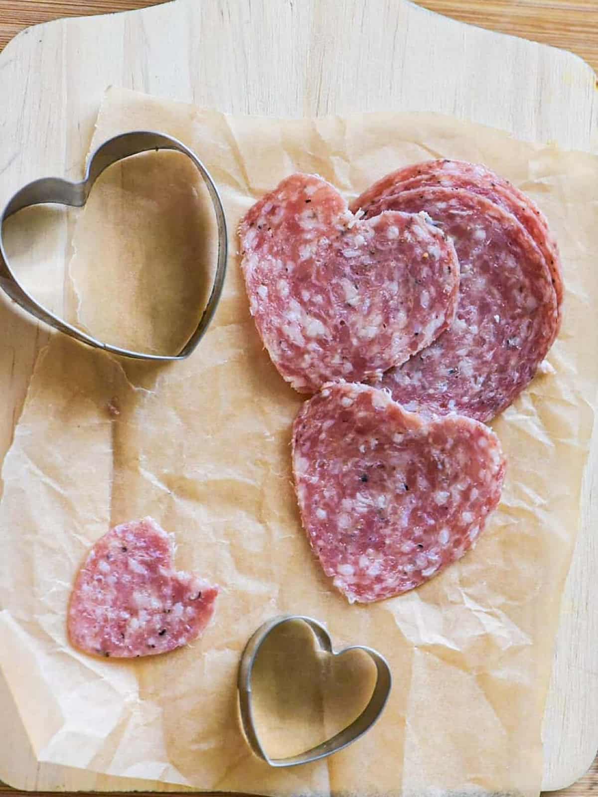 Valentines day charcuterie making salami hearts